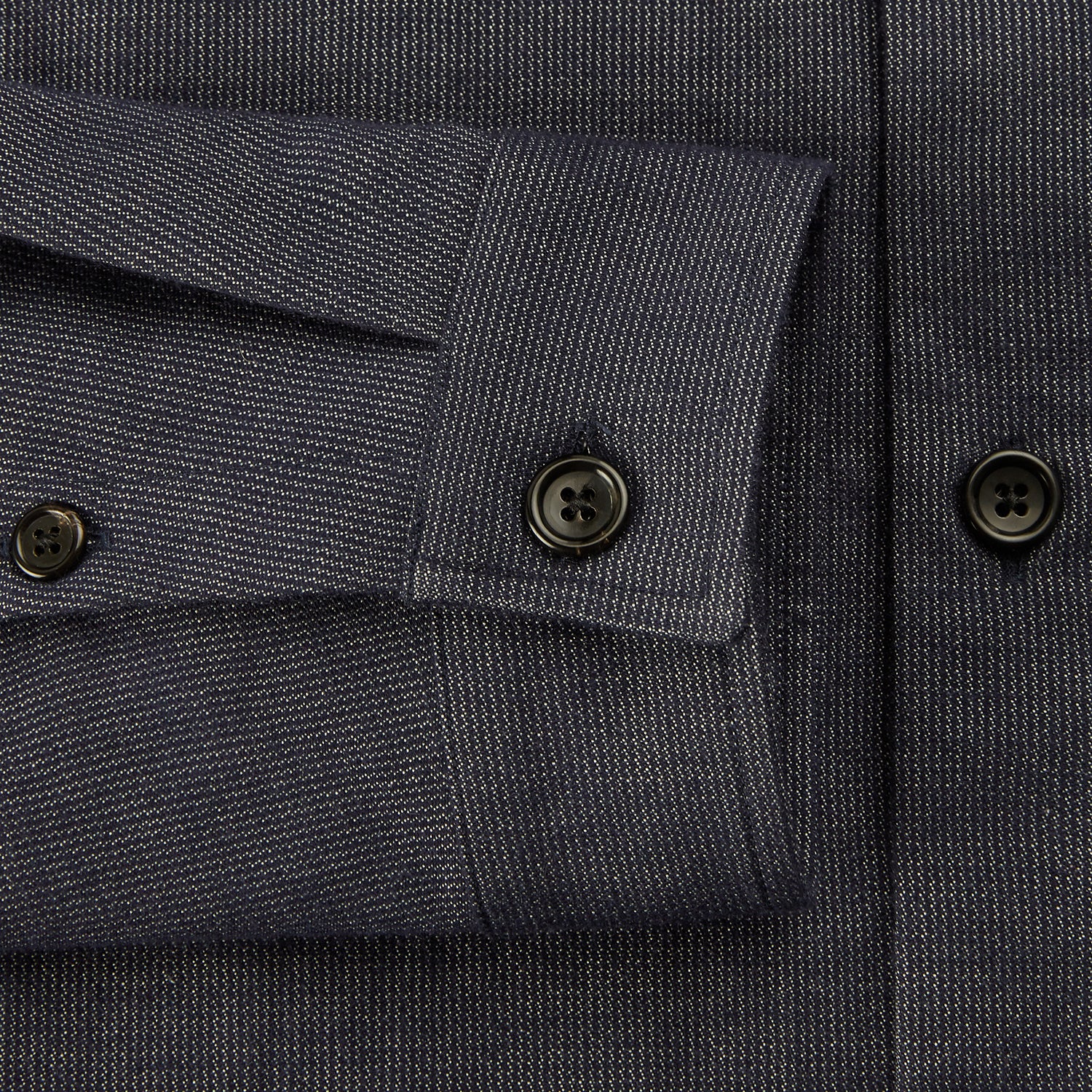 View 4 of product The Turnbull & Asser Navy Hampstead Overshirt features a collar, left chest pocket, two zippered pockets near the bottom, and a classic long-sleeve button-up design, shown laid flat on a white background.