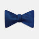 The HOUNDSTOOTH NAVY CRUISE BOW TIE by Turnbull & Asser features a refined textured pattern in blue, neatly tied and set against a white background—a stylish, versatile accessory for the modern gentleman.