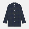 View 4 of product The Turnbull & Asser Blue Multi Check Wool Quin Pyjama Set features a long-sleeve button-up top with chest pocket and drawstring pants, both displayed flat on white—a luxurious choice for refined sleepwear.