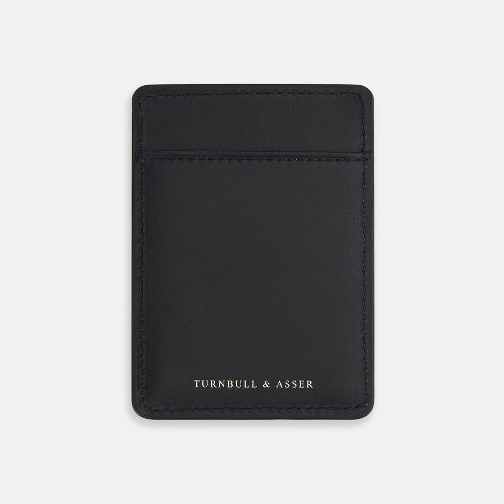 A navy Italian leather two-slot card case with minimal stitching and silver TURNBULL & ASSER text at the bottom center, shown on a plain white background—the perfect minimalist accessory.