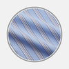 View 1 of product Close-up of Turnbull & Asser's Pale Blue Multi-stripe Cotton Fabric, featuring diagonal white, navy, and tan stripes displayed in a circular frame against a plain white background.