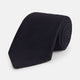 The GRENADINE NEW NAVY TIE by Turnbull & Asser features a dark navy blue woven texture, making it the perfect accessory for refined looks. Displayed against a plain white background.
