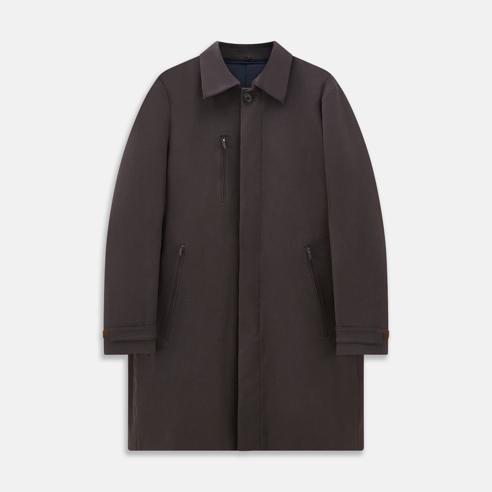 The Dark Chocolate John Arthur Trench Coat by Turnbull & Asser features a pointed collar, two large slanted side pockets, and a vertical chest pocket—a versatile 2-in-1 piece ideal for any occasion.