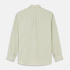 View 6 of product The Turnbull & Asser Soft Green Cashmerello Weekend Fit Finch Shirt features a Derby collar, long sleeves, chest pocket, white buttons, and cuffs. Laid flat on a white background.