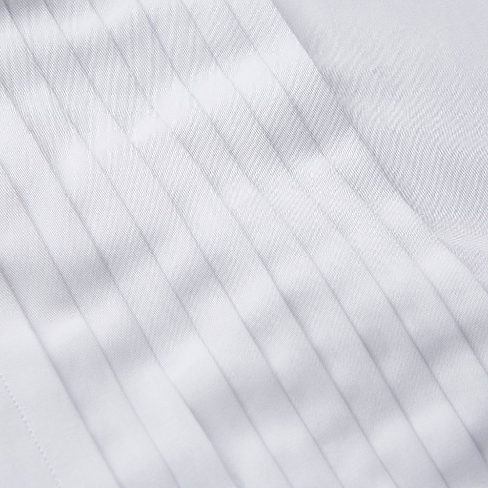 The Turnbull & Asser White Pleated Cotton Dress Shirt features a T&A collar and double cuffs, shown laid flat on a white background.