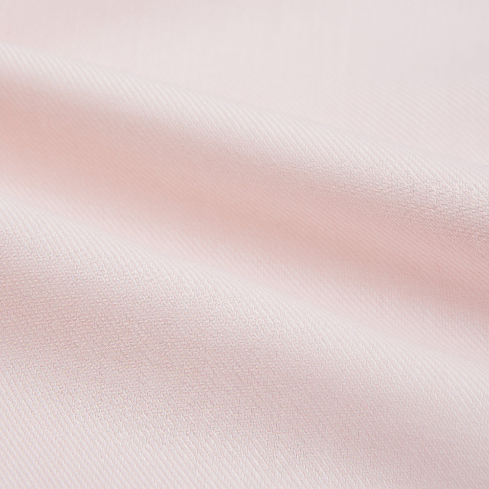 The Pale Pink Cotton Cashmere Mayfair Shirt by Turnbull & Asser features a classic collar, button-down front, and buttoned cuffs, crafted from a luxurious cotton-cashmere blend and displayed flat on a white background.