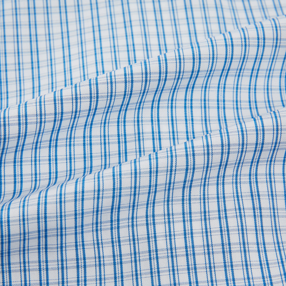 The Sky Blue Micro Graph Check Mayfair Shirt by Turnbull & Asser features a classic T&A collar, button-down front, and buttoned cuffs, shown laid flat on a white background.