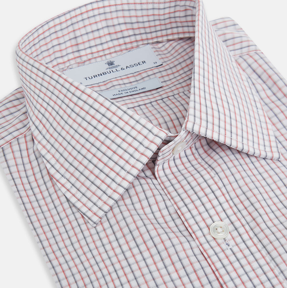 Turnbull & Asser Red and Blue Multi Check Mayfair Shirt with a classic T&A collar in premium Italian cotton, neatly laid flat on a white surface.