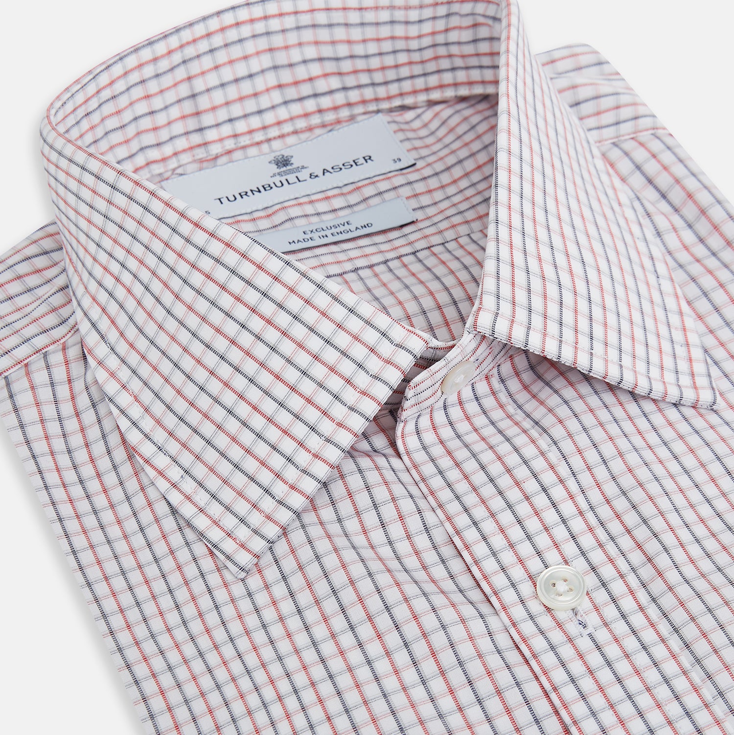 View 2 of product Turnbull & Asser Red and Blue Multi Check Mayfair Shirt with a classic T&A collar in premium Italian cotton, neatly laid flat on a white surface.
