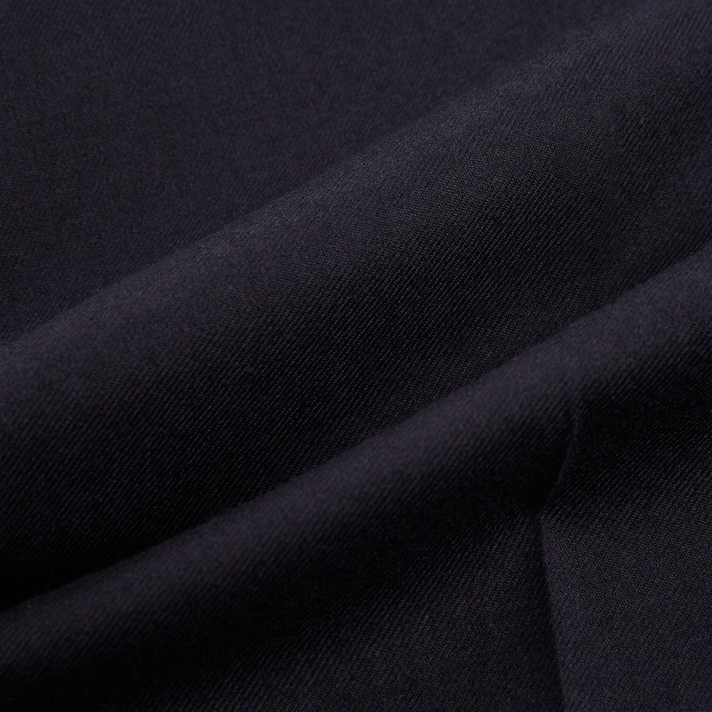 The Turnbull & Asser Short Navy Single Breasted Suit is shown flat on a white background, with a notch lapel jacket featuring two front pockets and matching trousers neatly folded underneath.