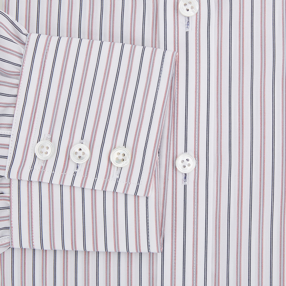 The Turnbull & Asser Red Multi Stripe Mayfair Shirt is a long-sleeve, button-up classic with a sharp collar and vibrant red multi stripes—an essential men's piece shown against a white background.
