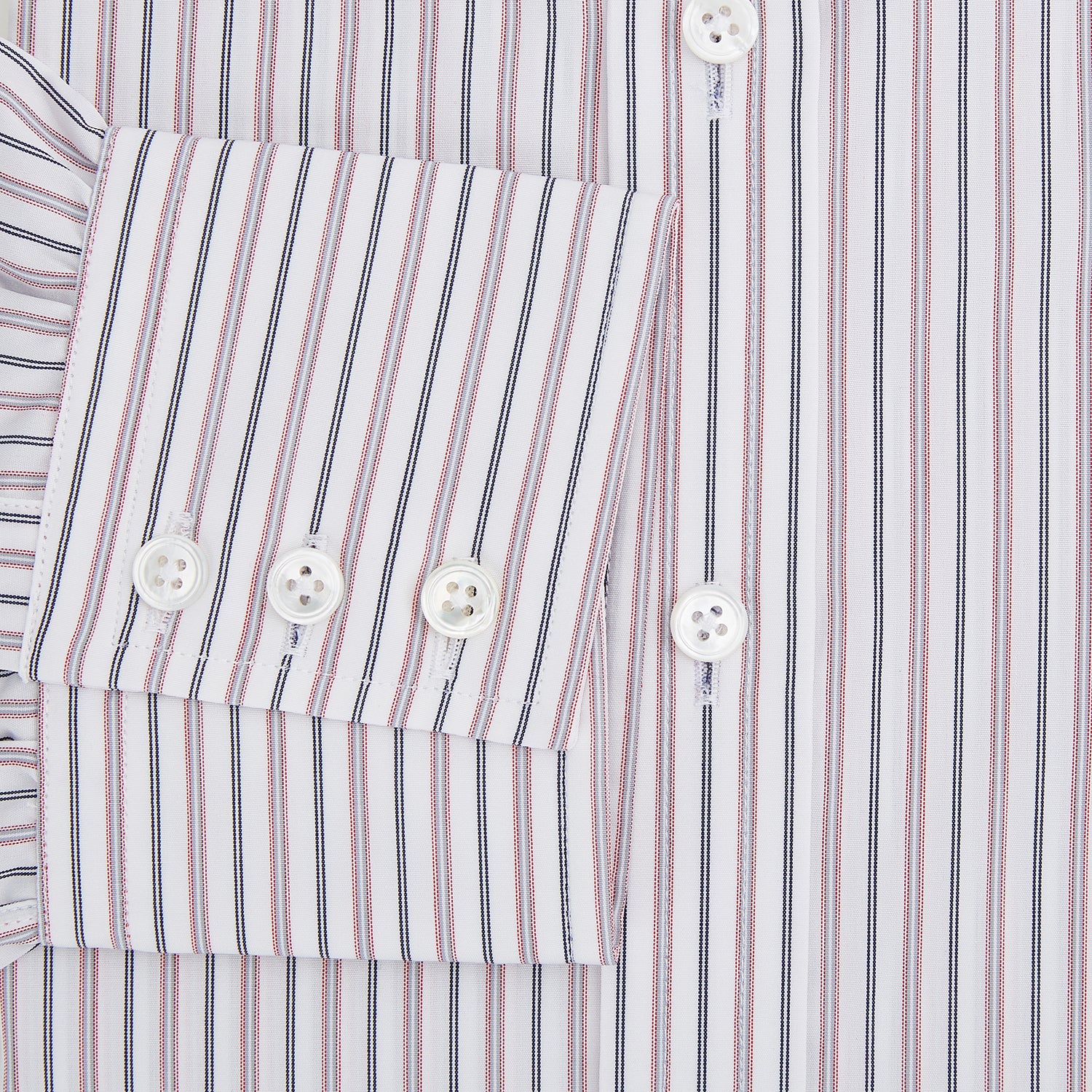 View 4 of product The Turnbull & Asser Red Multi Stripe Mayfair Shirt is a long-sleeve, button-up classic with a sharp collar and vibrant red multi stripes—an essential men's piece shown against a white background.