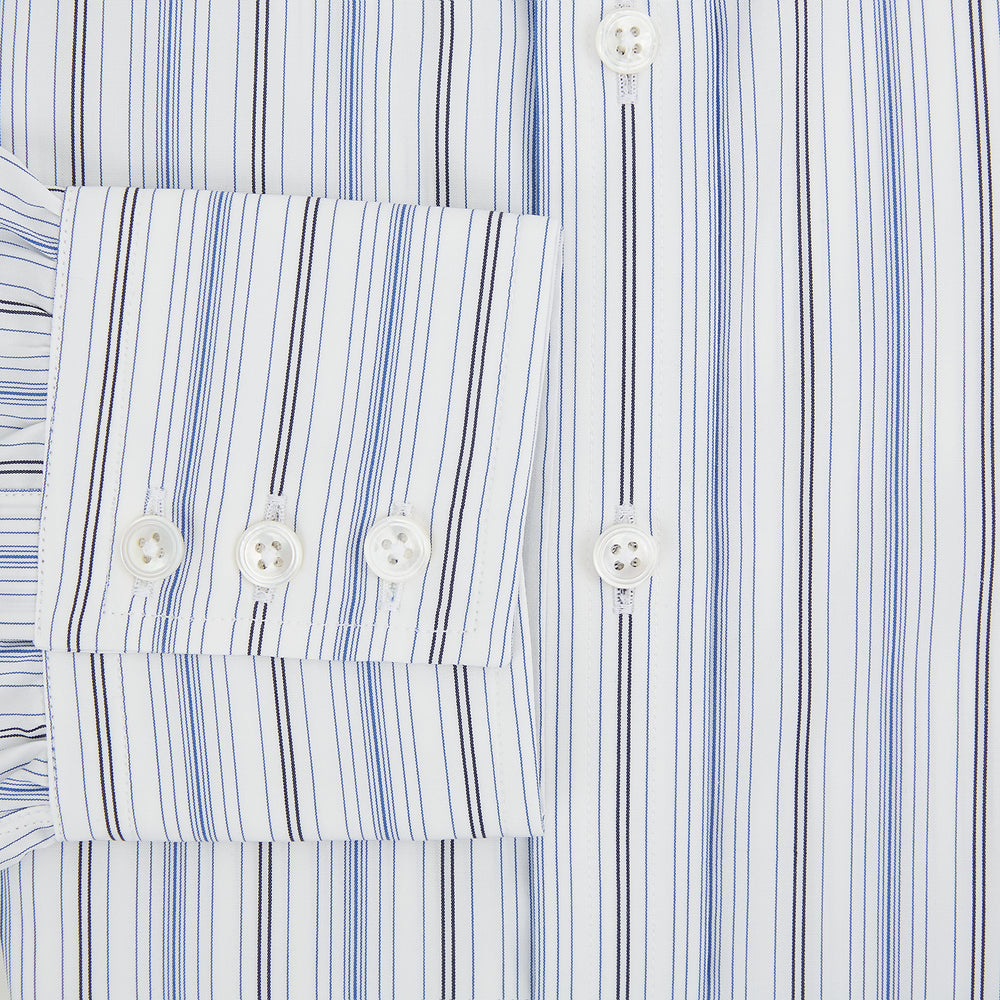 The Turnbull & Asser Navy and Blue Multi Stripe Mayfair Shirt features long sleeves, a T&A collar, and buttoned cuffs, shown against a white background.