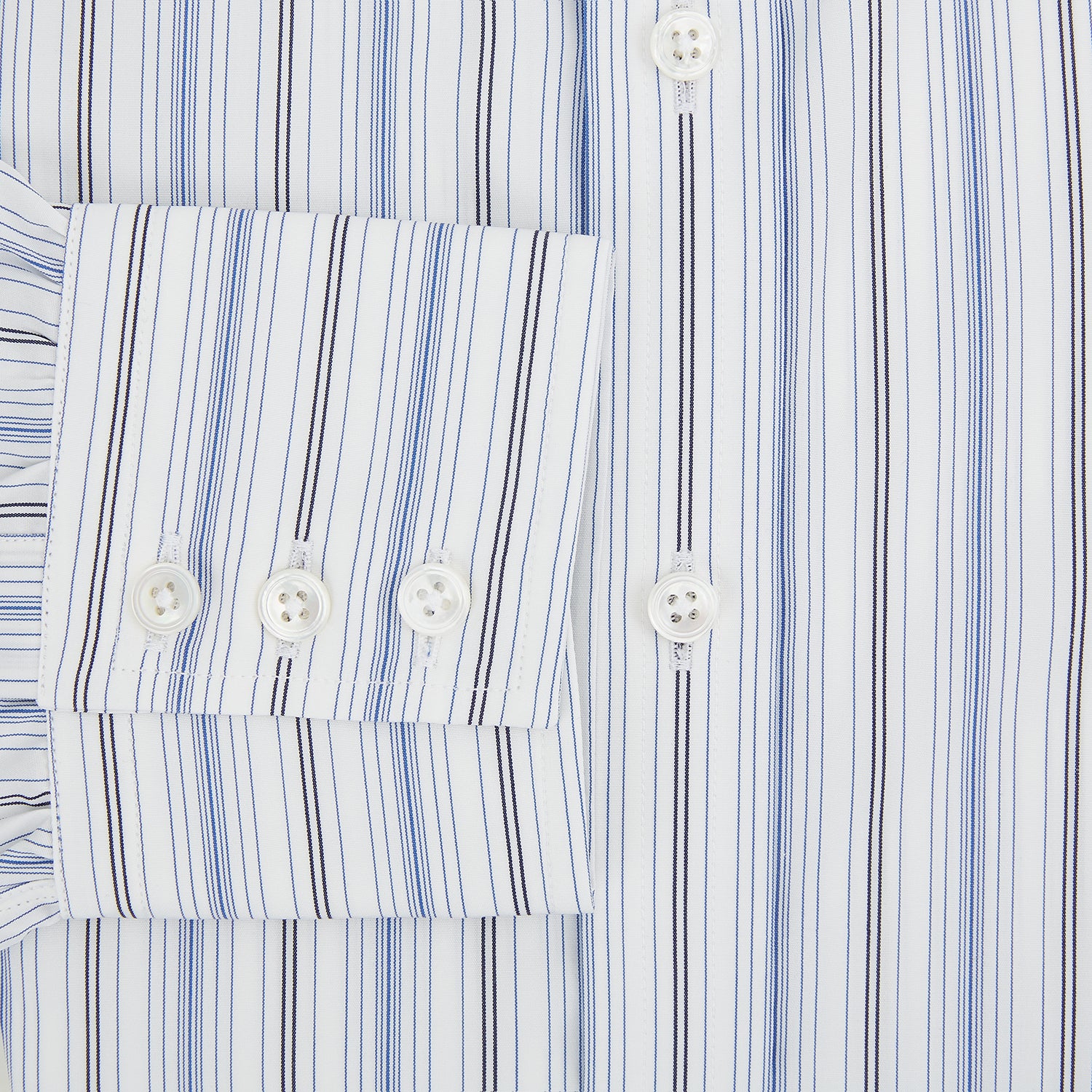 View 4 of product The Turnbull & Asser Navy and Blue Multi Stripe Mayfair Shirt features long sleeves, a T&A collar, and buttoned cuffs, shown against a white background.