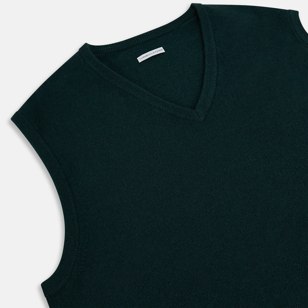 The Turnbull & Asser Forest Green V-neck Cashmere Vest, a sleeveless knit for men, is displayed against a plain white background.