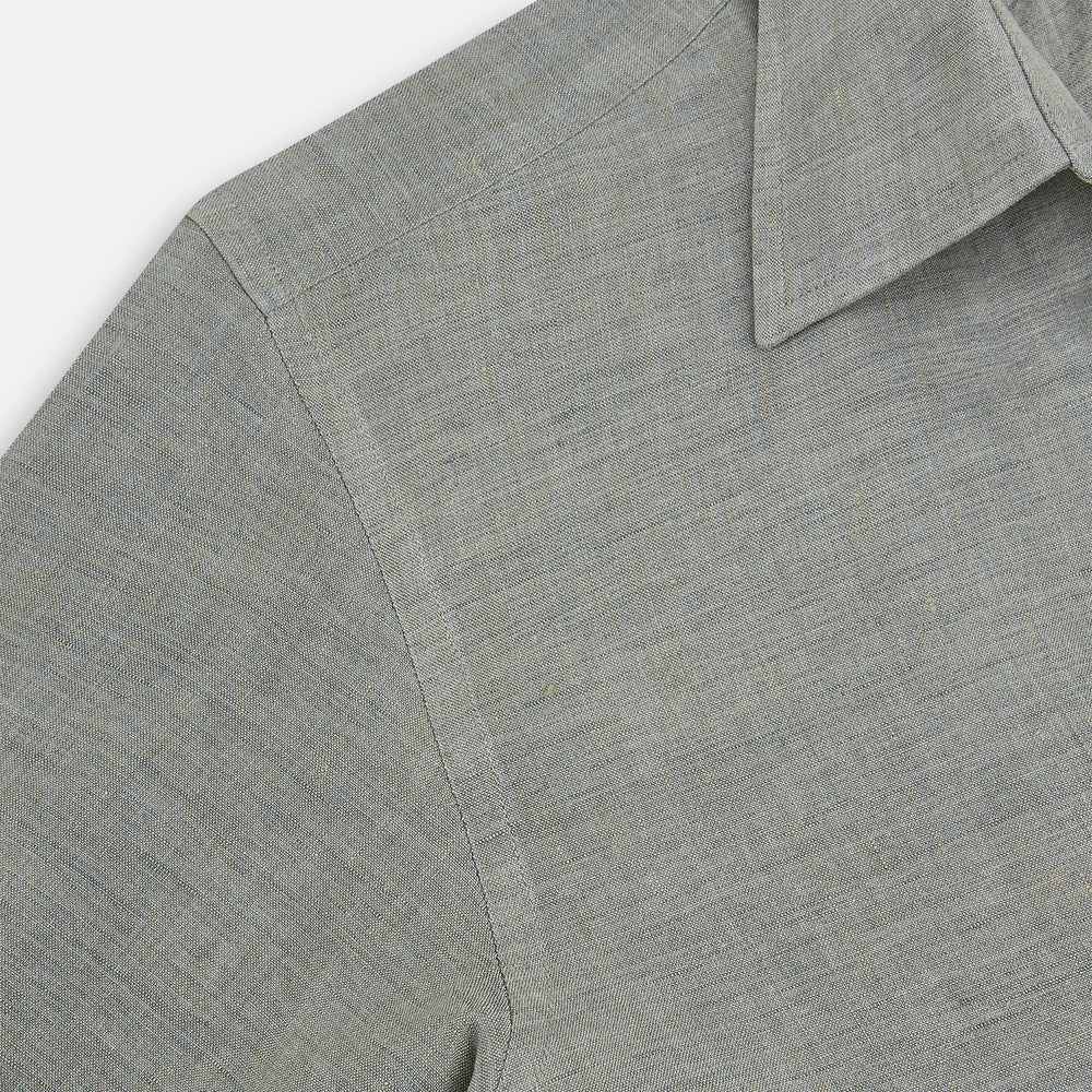 The Flint Grey Linen Westminster Shirt by Turnbull & Asser features long sleeves, a pointed Westminster collar, white buttons, and fine British craftsmanship, shown on a plain white background.