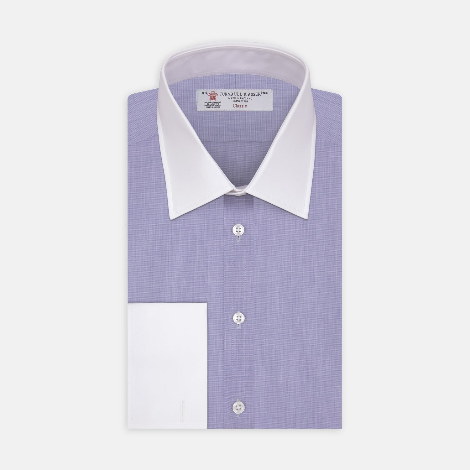 View 1 of product The Wall Street Shirt with White T&A Collar by Turnbull & Asser, as seen on Gordon Gekko, is folded neatly to showcase its light purple color, crisp French cuffs, and iconic contrasting collar against a plain background.