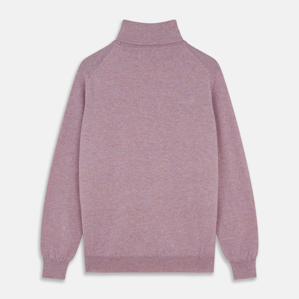 The Turnbull & Asser Lilac Heather Aubrey Cashmere Roll Neck Jumper features ribbed cuffs and hem—ideal for pairing with your favorite tailored trousers.