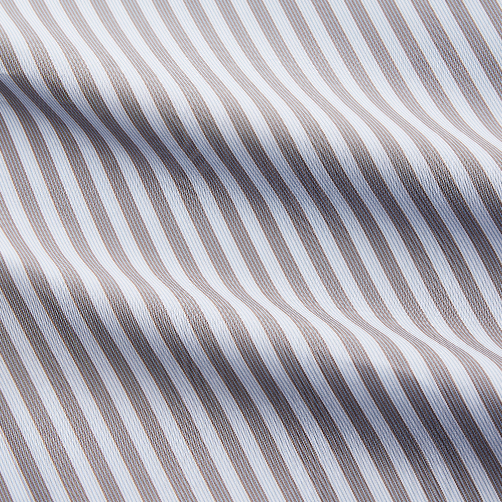 The Turnbull & Asser Pale Blue Multi Stripe Cotton Regular Fit Mayfair Shirt features long sleeves, a pointed collar, buttoned cuffs, and vertical stripes in pale blue tones, displayed against a white background.