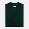 View 4 of product The Turnbull & Asser Forest Green Cashmere Cardigan—featuring long sleeves, a V-neck, button-down front, ribbed cuffs and hem, plus two front pockets—is shown against a plain white background.