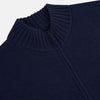 View 2 of product The Turnbull & Asser Navy High Neck Merino Zipped Cardigan is a long-sleeve knit with ribbed mock neck, cuffs, and hem, shown on a plain white background.