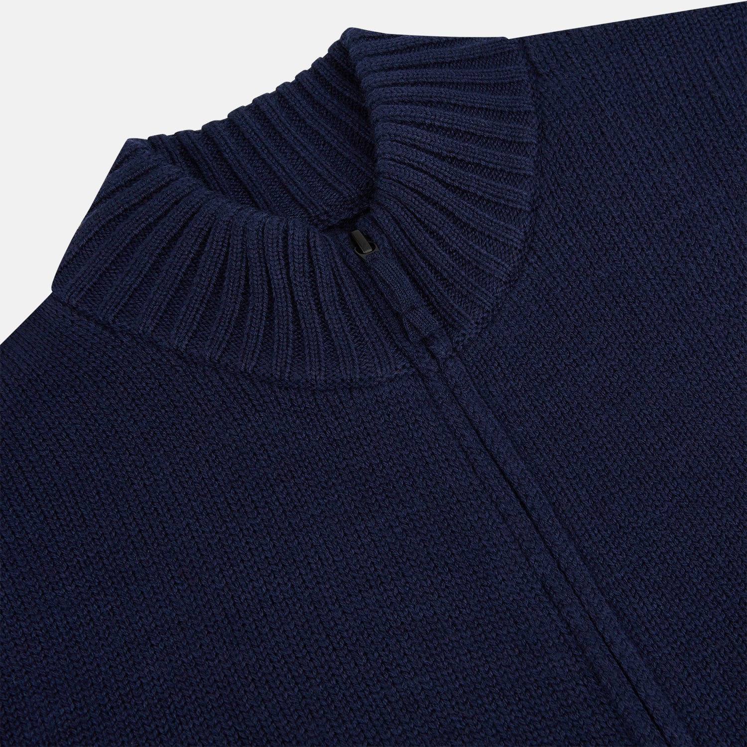 View 2 of product The Turnbull & Asser Navy High Neck Merino Zipped Cardigan is a long-sleeve knit with ribbed mock neck, cuffs, and hem, shown on a plain white background.