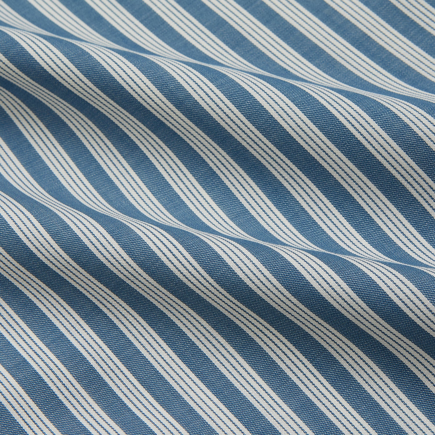 View 4 of product Turnbull & Asser’s Pale Blue Multi Stripe Weekend Fit Wool Shirt features a Derby collar, 1-button cuffs, and a chest pocket—ideal for casual layering. Shown laid flat on a white background for easy styling.