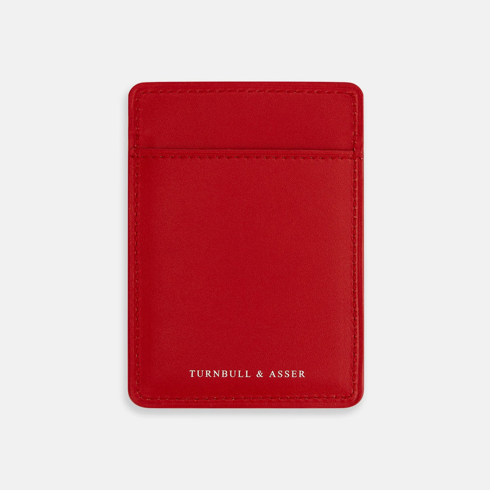 A vibrant red Turnbull & Asser Two-slot Card Case, crafted from Italian leather with the brand name embossed in white, is shown on a plain white background—a sleek and minimalist accessory.