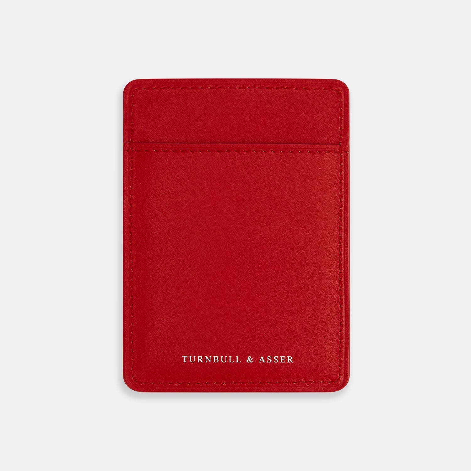 View 1 of product A vibrant red Turnbull & Asser Two-slot Card Case, crafted from Italian leather with the brand name embossed in white, is shown on a plain white background—a sleek and minimalist accessory.