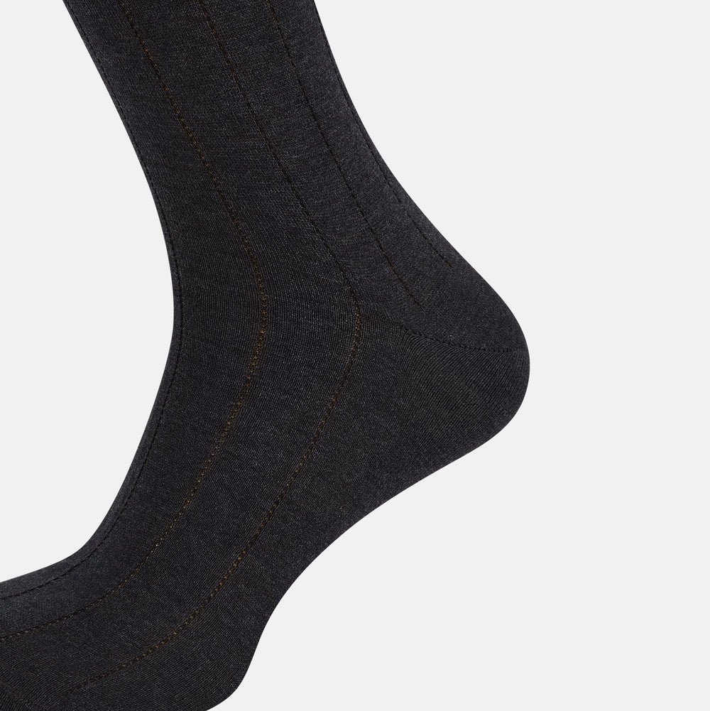 A Charcoal Dash Striped Mid-Length Sock from Turnbull & Asser is shown on a plain white background, positioned to emphasize its ribbed texture and length.