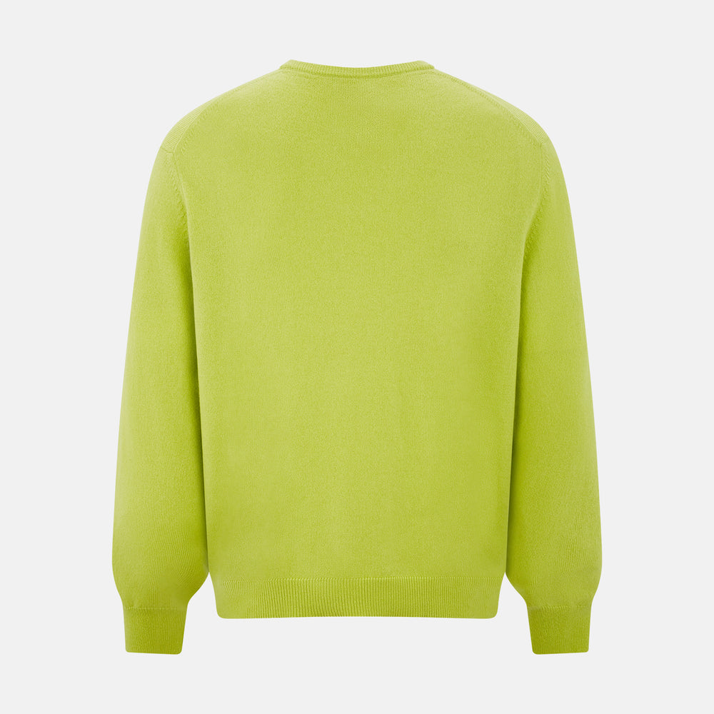 The Lemon Green Cashmere V-neck Jumper by Turnbull & Asser features ribbed cuffs and hem—an essential long sleeve knitwear piece, shown against a white background.