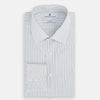 View 5 of product The Navy and Brown Pinstripe Mayfair Shirt by Turnbull & Asser, crafted from Italian cotton with long sleeves, a collar, and buttoned cuffs, is displayed on a plain white background.
