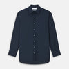 View 1 of product The Turnbull & Asser Navy Cotton Regular Fit Mayfair Shirt is a long-sleeved men’s formal shirt with a collar and white buttons, shown against a plain white background.
