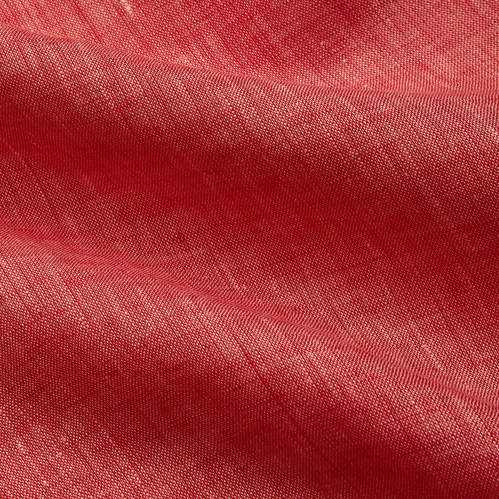 The Turnbull & Asser Pink Linen Weekend Fit Hayne Shirt is a casual, long-sleeve button-down with a subtle texture and white buttons, neatly laid flat on a white background.