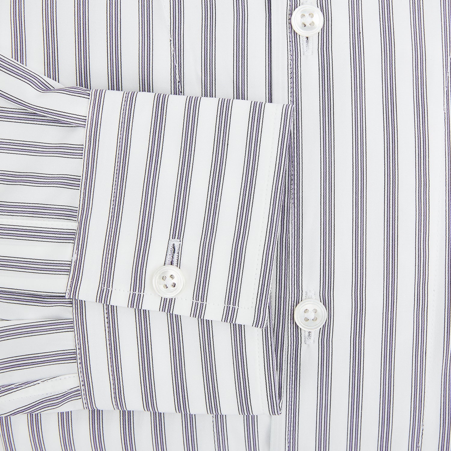 View 4 of product The Turnbull & Asser Purple Multi Stripe Quarzo Nightshirt features a collared, button-front design with a chest pocket and vertical white and light gray stripes, shown laid flat on a white background.