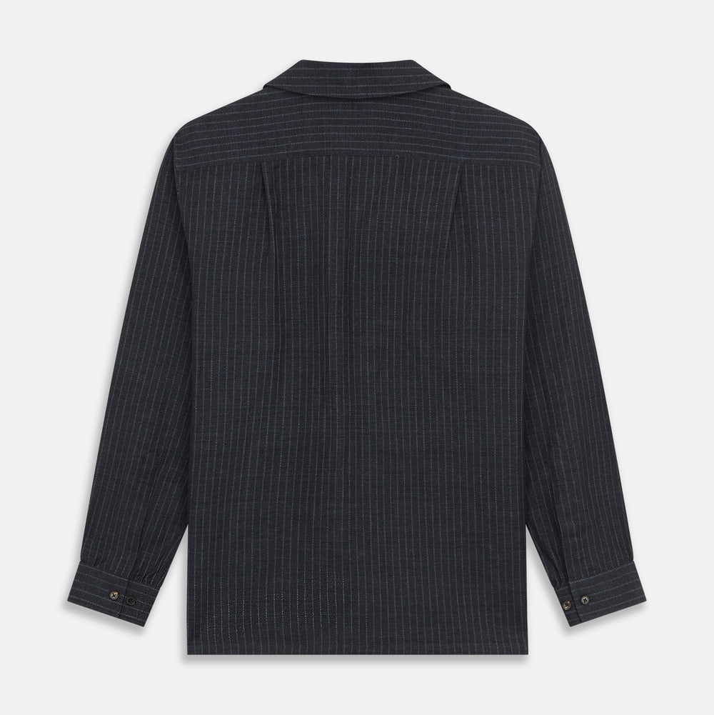 The Navy Tailored Pinstriped Shirt Jacket by Turnbull & Asser is a smart-casual, lightweight cotton-linen piece with long sleeves, a collar, left chest pocket, and front buttons for easy style.