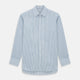 The Turnbull & Asser Sky Blue Double Stripe Mayfair Shirt features sky blue and white vertical stripes, a T&A collar, buttoned cuffs, and is displayed flat on a white background.