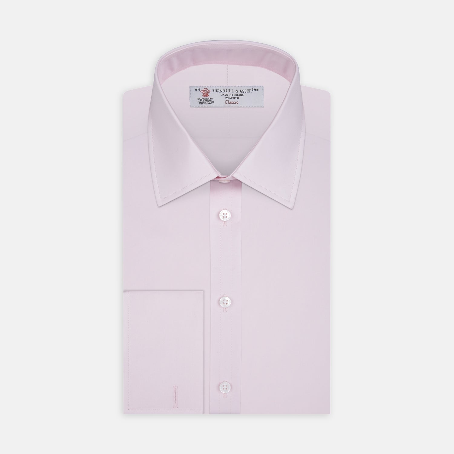 View 1 of product A Turnbull & Asser Pink Cotton Shirt with a T&A collar and double cuffs is displayed against a white background. The men's shirt features long sleeves, white buttons, and the label is visible inside the collar.