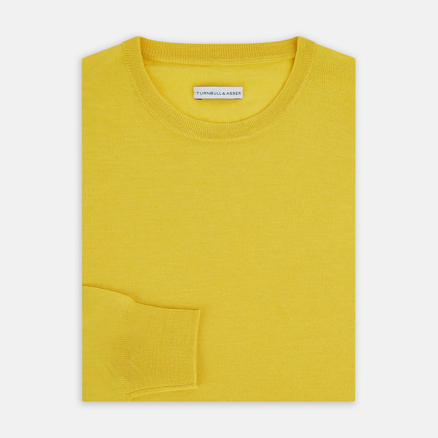 View 4 of product The Turnbull & Asser Canary Yellow Merino Round Neck Jumper features long sleeves and a crew neckline, shown here against a white background.