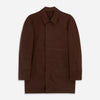 View 1 of product The Burgundy Grayson Car Coat by Turnbull & Asser, made from a rain-resistant cotton blend with a collar, hidden front buttons, and slanted pockets, is displayed flat on a white background in a minimalist style.