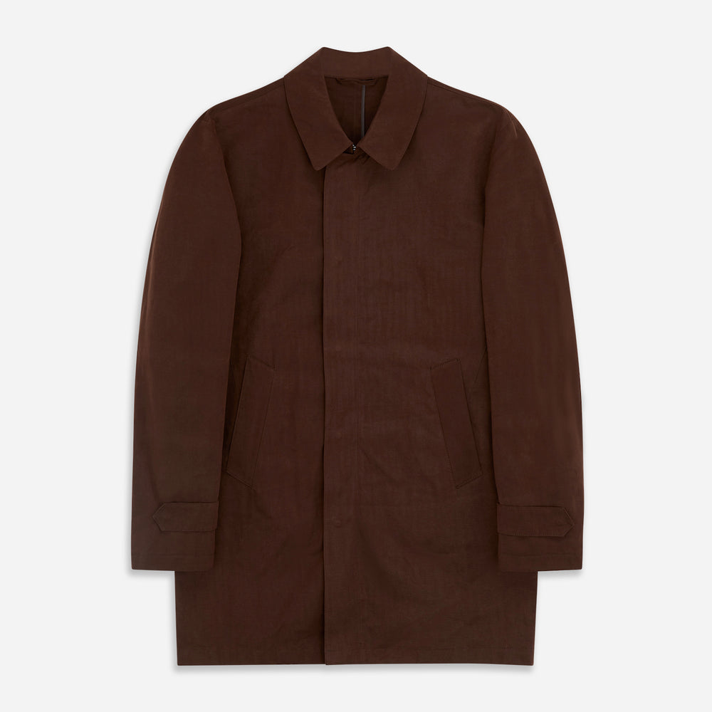 The Burgundy Grayson Car Coat by Turnbull & Asser, made from a rain-resistant cotton blend with a collar, hidden front buttons, and slanted pockets, is displayed flat on a white background in a minimalist style.