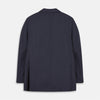 View 4 of product The Turnbull & Asser Navy Wool Blend Barrington Blazer features a notched lapel, single-button closure, three front pockets, and sleeve button accents, shown against a plain white background.