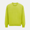 View 1 of product The Turnbull & Asser Lemon Green Cashmere Round Neck Jumper features long sleeves with ribbed cuffs and hem, displayed on a white background.