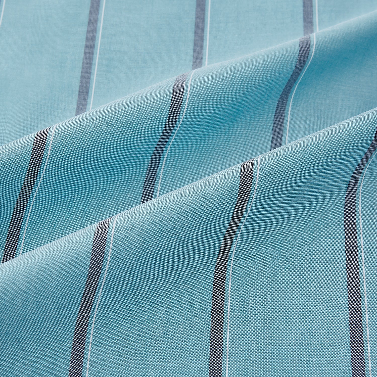 View 8 of product The Cendre Blue Track Stripe Westminster Shirt by Turnbull & Asser features a light blue hue, dark vertical stripes, button-down front, classic collar, and buttoned cuffs—showcasing British craftsmanship.