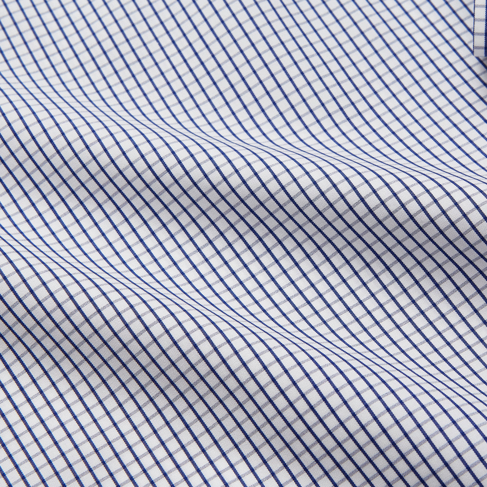 The Navy Check Cotton Regular Fit Mayfair Shirt by Turnbull & Asser features a timeless checked pattern for a classic look.