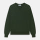 The Turnbull & Asser Green V-Neck Cashmere Jumper, made from soft Scottish cashmere, features long sleeves with ribbed cuffs and a ribbed hem. It is shown laid flat on a white background.
