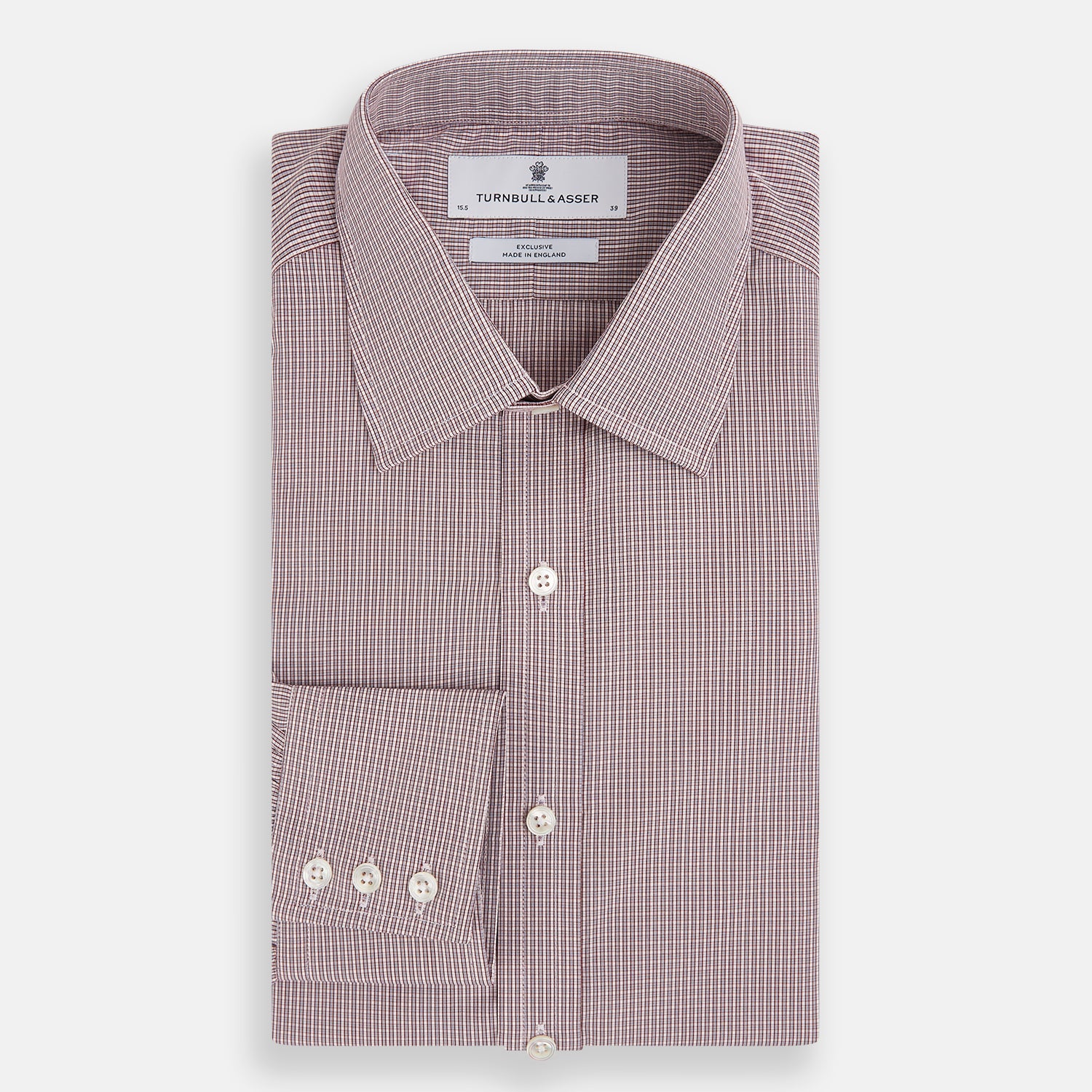 View 5 of product The Turnbull & Asser Burgundy Micro Shadow Check Mayfair Shirt features long sleeves, a classic collar, and white buttons. In light red and white shades, this button-up is perfect for formal wear and is shown laid flat against a white background.