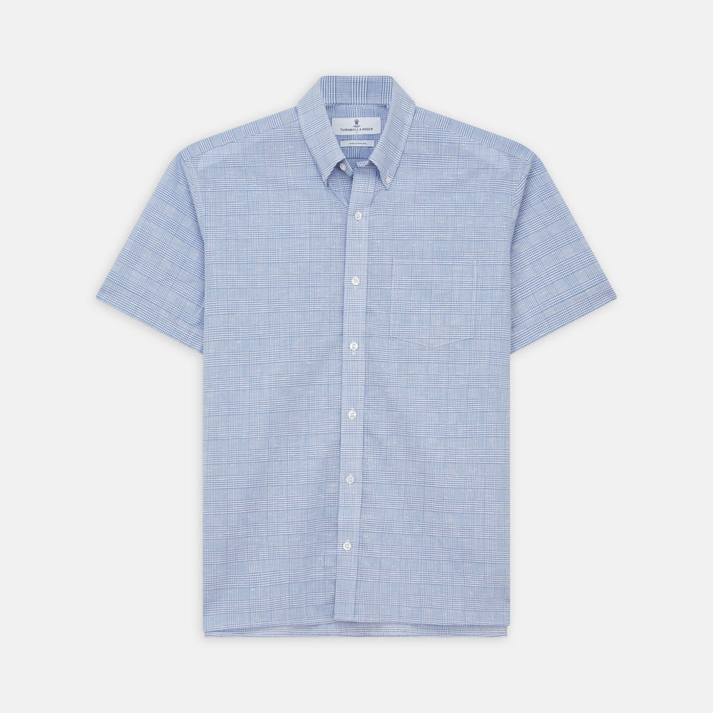 The Turnbull & Asser Pale Blue Multi Check Cotton Weekend Fit Williams Shirt features short sleeves, a pointed collar, single chest pocket, and premium Italian cotton with a subtle checkered pattern, shown on a white background.