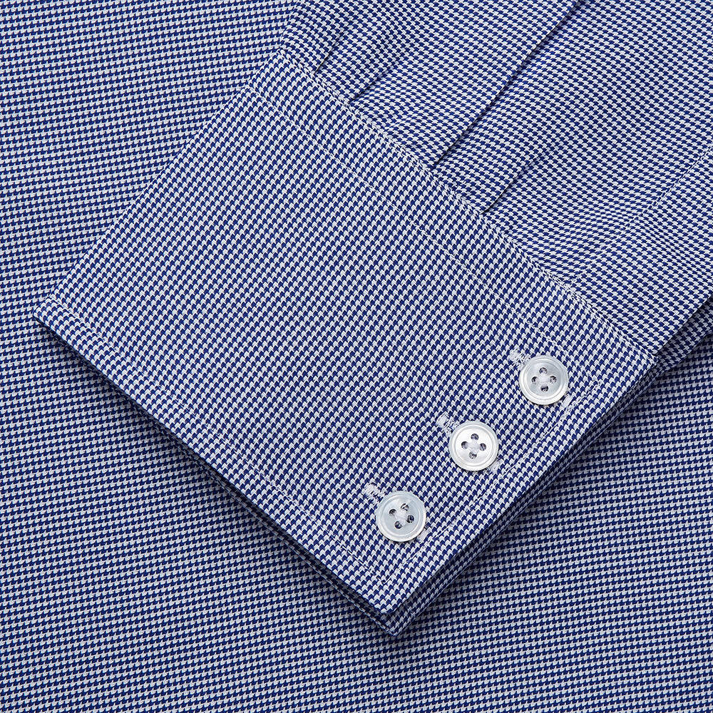 A navy pattern cotton voile regular fit Mayfair shirt by Turnbull & Asser, featuring long sleeves, a button-up front, classic collar, and white buttons, displayed flat against a white background.
