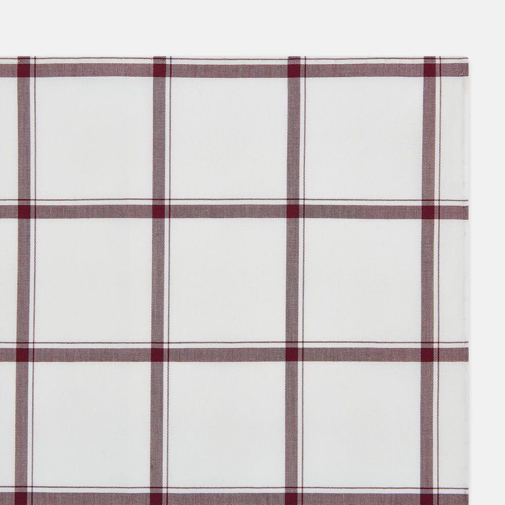 The Turnbull & Asser Burgundy Grid Check Hand-Rolled Handkerchief features a white base with burgundy grid lines forming large squares and is finished with elegant hand-rolled edges.